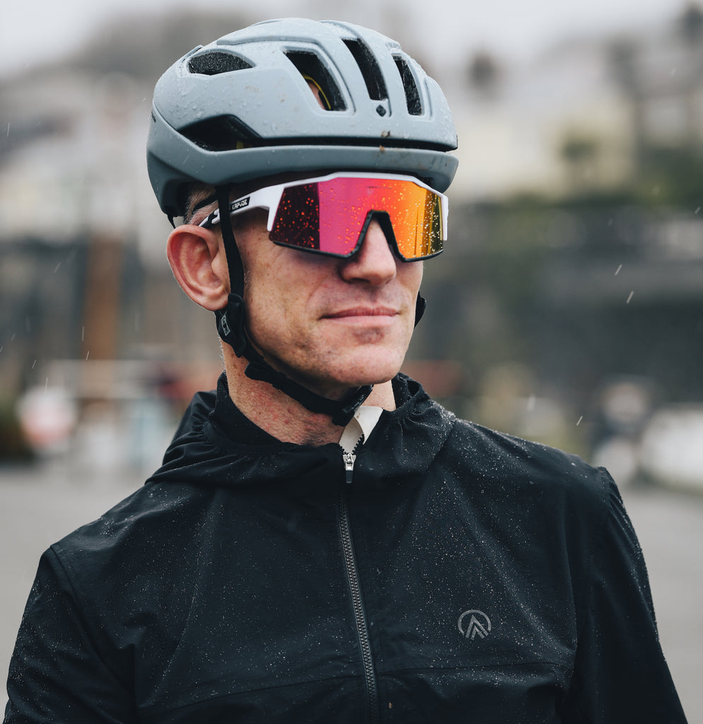 Black recycled soft-shell cycling jacket with reflective detail by GRVL