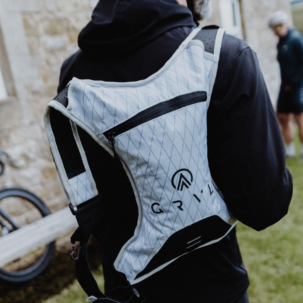 white racing hydration pack gravel | grvl
