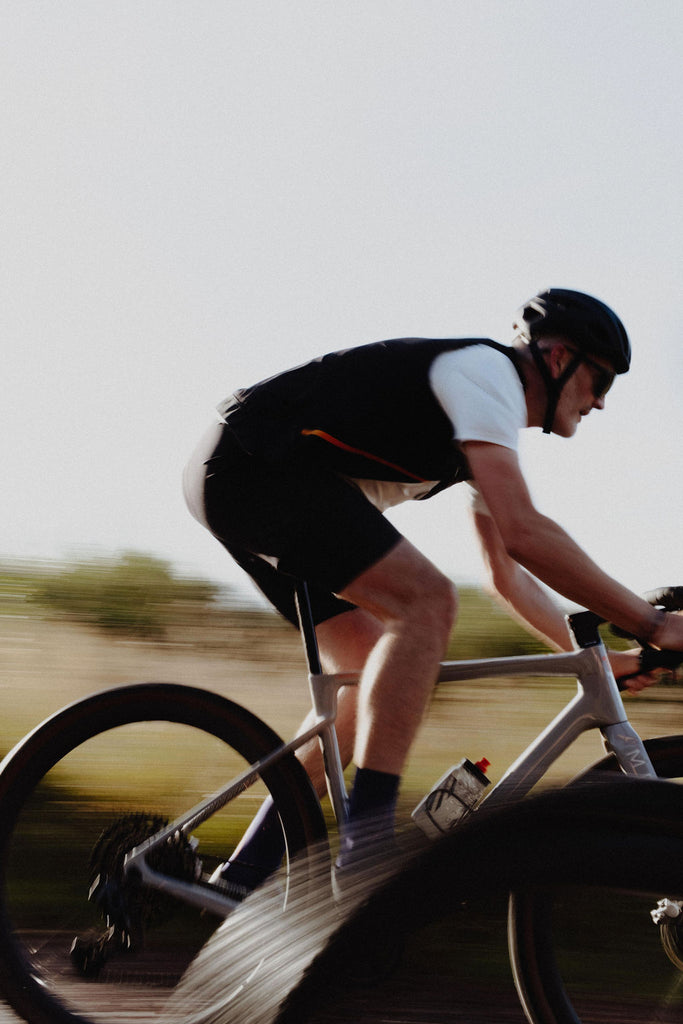 cycling gilet black on bike | grvl