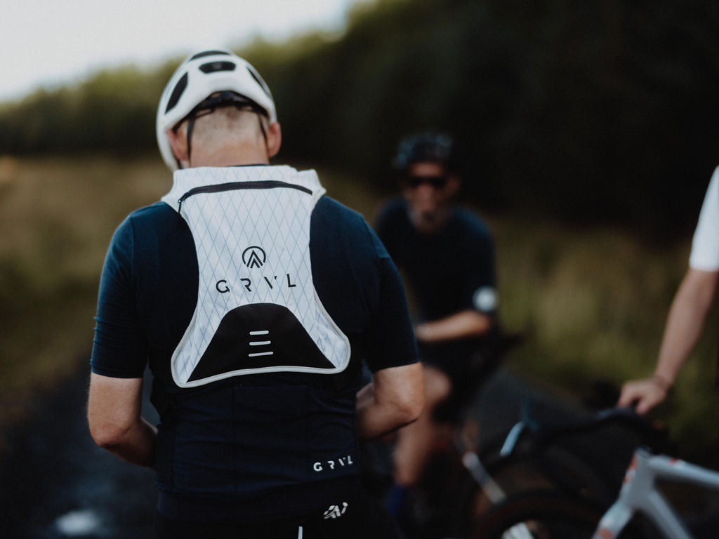 gravel cyclist outfit gravel hydration pack | grvl